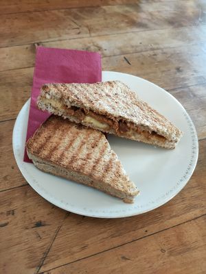 Grilled toast sandwich with cheese and seitan at Black Veg in Bonn