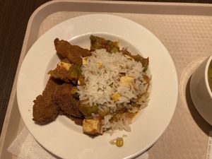 Brussel sprouts with tofu and tomato/pepper sauce with rice and fried Seiten  at Vega City in Budapest