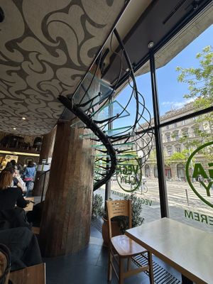 Love this staircase & watching the world go by   at Vega City in Budapest