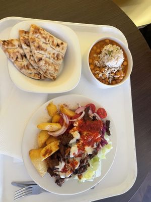 gyro bowl with flatbread and chickpea curry—cost around £12  at Vega City in Budapest