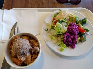 Baked potatoes with cabbage and buckwheat, mixed salad at Vega City in Budapest