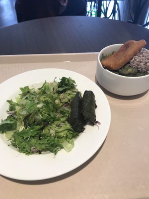 Salad, fried cashew cheese, wheat, and pea soup at Vega City in Budapest