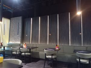 Seating area opposite the kitchen at DonMono  in Vienna
