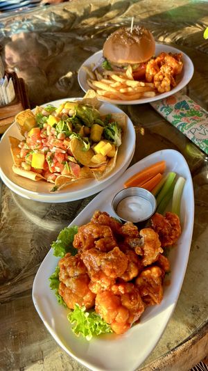 Wings, nachos and burger   at El Avion in Manuel Antonio