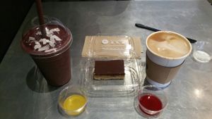 Smoothie, caramel slice & coffee at Juicebaby in South West London
