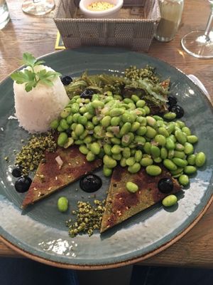 vegan fish filet with soy beans, rice, wakame and pistachios at Mykene in Leuven