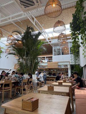 Hall view. Spacious, high ceiling, and calm atmosphere   at Roots Plant-based Cafe - Hẻm 41 Xuan Thuy in Ho Chi Minh City