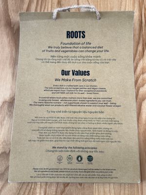 While I am waiting for my food, I read this   at Roots Plant-based Cafe - Hẻm 41 Xuan Thuy in Ho Chi Minh City
