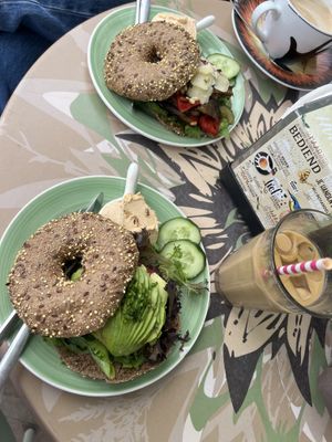 Vegan Avocado Bagel (Bottom) & oat milk coffee  at Bagels & Beans - Statenkwartier in The Hague