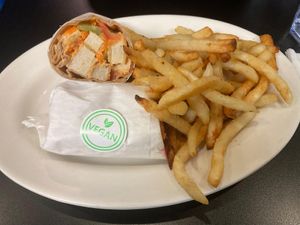 Deluxe vegan buffalo chicken wrap with air fries at Fuel Cafe in Hicksville