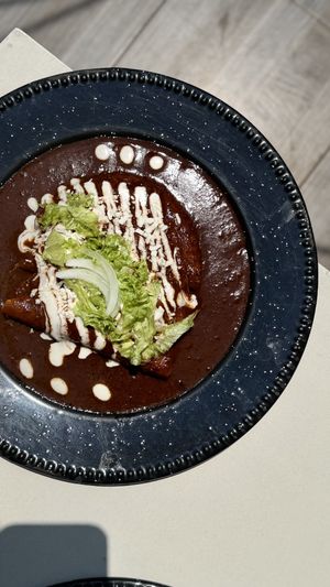 Enchiladas de mole rellenas de plátano macho   at Bistro 54 in Mexico City