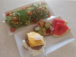 Ceasar Salad with Substitute Avocado anf Classic Cheeseburger at JOi Café in Westlake Village