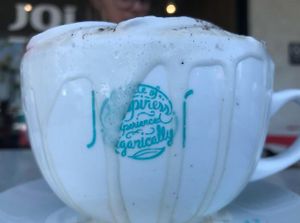 Ginormous (it's a word...go look it up...no don't) Coffee.  The cups are awesome and this one happens to say why this is my favorite place..."Joi...a state of happiness experienced organically"  That says it all. at JOi Café in Westlake Village