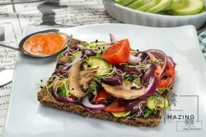 raw-vegan pizza with almond-flax crust. Deliciously crunchy at Rawmazing in Bucharest