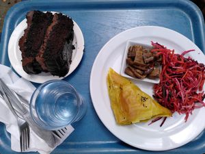 Samosa, salad and chocolate cake at Rainbows End Cafe in Glastonbury
