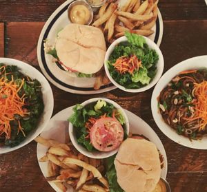 Mushroom Burger, Double Bacon and Cheese Burger, Beet salad and Thai Noodles  at MeeT on Main in Vancouver