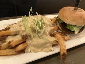 poutine and a burger  at MeeT on Main in Vancouver
