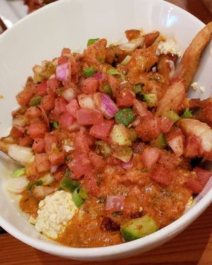 bc (Butter "chicken") poutine at MeeT on Main in Vancouver