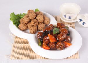 Crisp-fried viggie balls with sweet and sour sauce and spicy salt at JingLianZhai Vegetarian Restaurant in Beijing