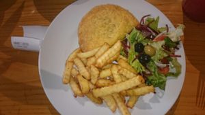 Jamaican Patti with chips and salad  at Karamel in North London