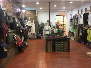 T-shirts and backpacks at Sapato Verde in Lisbon