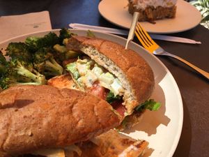 Buffalo Chick’n burger and roasted broccoli  at Veggie Grill in Corte Madera