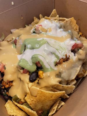 Nachos loaded with all the sauces  at Viva in Tacoma
