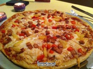 Vegan Pizza with 'ham', pineapple and rice cheese-- delicious! at Govinda's Veggie Garden in San Juan
