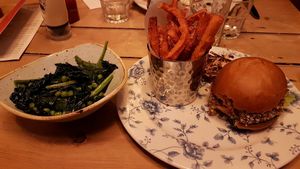 'Thai veggie' with sweet potato fries and a side of green vegetables. at The Cosy Club in Salisbury