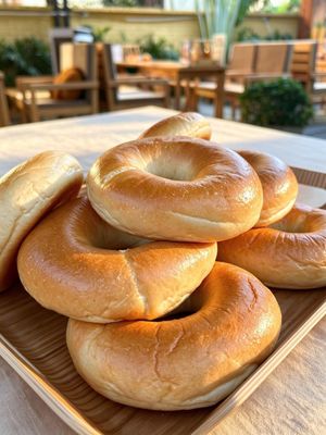 Freshly baked bagels with a chewy texture and golden crust, perfect for breakfast or paired with your favorite coffee.  at La Miette Bakery & Bistro in Ninh Binh