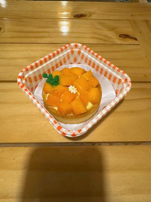 Mango Tart – Fresh mango tart with a buttery crust and smooth pastry cream. at La Miette Bakery & Bistro in Ninh Binh