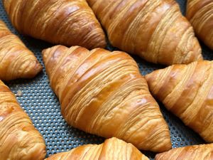 Butter Croissant – Classic French butter croissant with a flaky, golden crust. at La Miette Bakery & Bistro in Ninh Binh