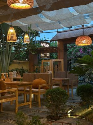 Relax in our peaceful garden with comfortable outdoor seating, perfect for breakfast, brunch, coffee and homemade pastries. at La Miette Bakery & Bistro in Ninh Binh
