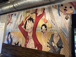 Murals of one piece inside  at Muntay - Vegan Asian Kitchen in Hamburg