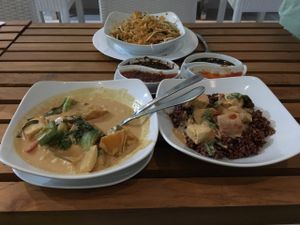 Thai red curry with red rice and pad thai  at Banana Leaf Vegan Thai Fusion in Canggu
