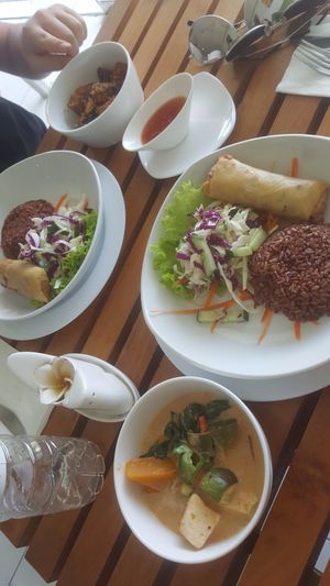 The combination plate which was $7.50 Australian. 
I chose the tofu red curry and my partner chose the pumpkin and eggplant, basil  stir-fry. It came with your choice of rice, a side salad and a spring roll.  at Banana Leaf Vegan Thai Fusion in Canggu