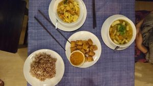 Brown rice, Panang curry, spring rolls, vegetable soup at May Kaidee Chiang Mai in Chiang Mai
