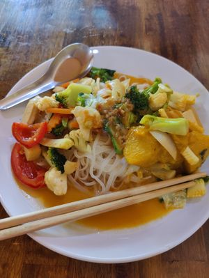 Steam noodles with vegetables and curry peanut sauce at May Kaidee Chiang Mai in Chiang Mai