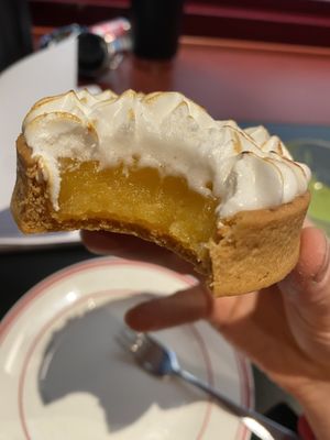 Lemon meringue tart- the lemon curd was smooth and divine, the meringue was sweet and heavenly, and the short crust pastry was firm enough to be picked up. Delicious!  at Smith & Deli CBD in Melbourne