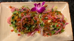 Sopes La Maria! Thick corn tortilla cups, no cheese/crema, refried/black beans, avocado, pico de gallo, & lettuce. Ask for hot sauce & pickled onions to maximize flavor!  at Manolete's Cocina Gourmet in Winchester