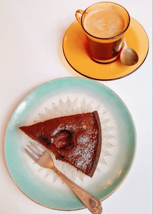 Raspberry cake and coffee at Cafe Valentin in Berlin