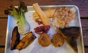 Half of the Vegan Plate. Seared baby bok choy, yucca fries, rice and beans, jerk sweet potato, tostones, and smoked calabaza. at Johnny Lime in St John