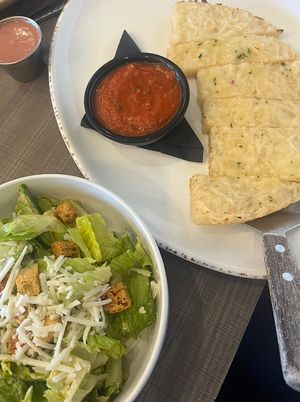 vegan cheese bread and side vegan Caesar salad  at Picazzo's Organic Italian Kitchen in Phoenix