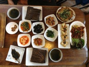 Lotus leaf wrap with bulgolgi and all the fixins! at Dajeon Cafe in Busan