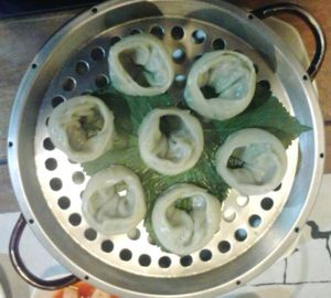Tasty steamed dumplings served with daikon kimchi and fried beancurd at Dajeon Cafe in Busan