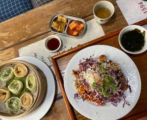 Dumplings and some kind of fried ckn.  Loved the sides the best.    at Dajeon Cafe in Busan