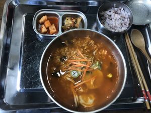 Ramen with dumplings and rice at Dajeon Cafe in Busan