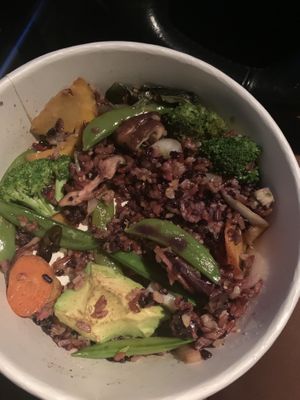 half eaten forbidden rice bowl add avocado SO FLAVORFUL YUM!! at Flower Child - 44th in Phoenix