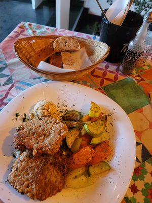 Tofu burger plate comes with tasty bread at Restoran Aj'Zdravo in Banja Luka
