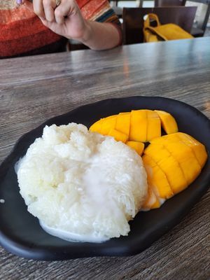 Mango in season with a savory sweet rice, surprisingly fun and tasty. at Vegan Glory in Los Angeles